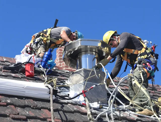 Protective chimney cap installed by Waxhaw Chimney Sweep in Waxhaw, NC