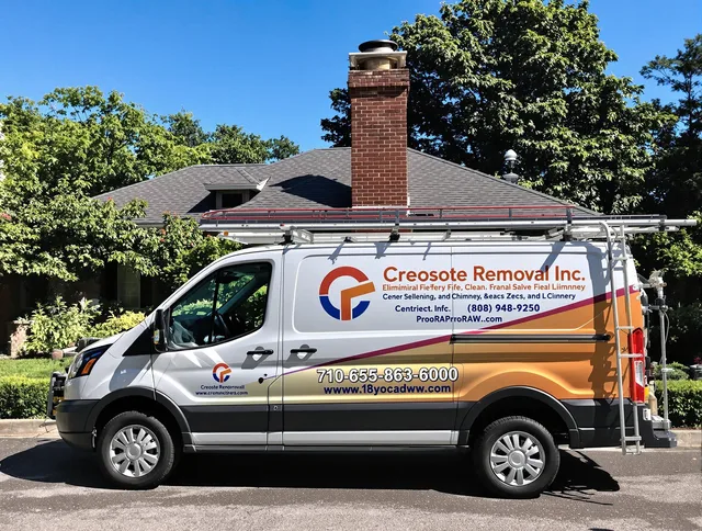 Waxhaw Chimney Sweep technician removing creosote safely in Waxhaw, NC