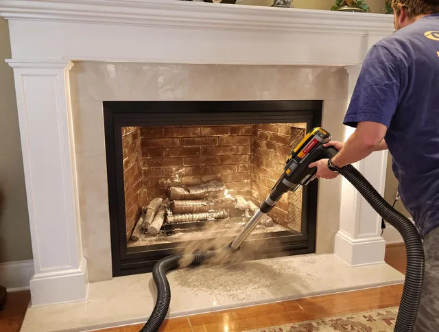 Fireplace cleaning performed by Waxhaw Chimney Sweep in Waxhaw, NC