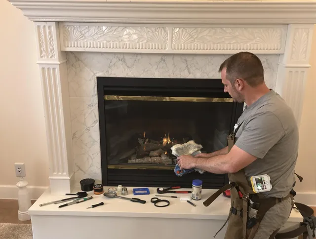 Waxhaw Chimney Sweep performing fireplace maintenance in Waxhaw, NC